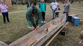 Seminole Tribe Member Pedro Zapeda demonstrates the traditional art of canoe carving for Mission visitors.