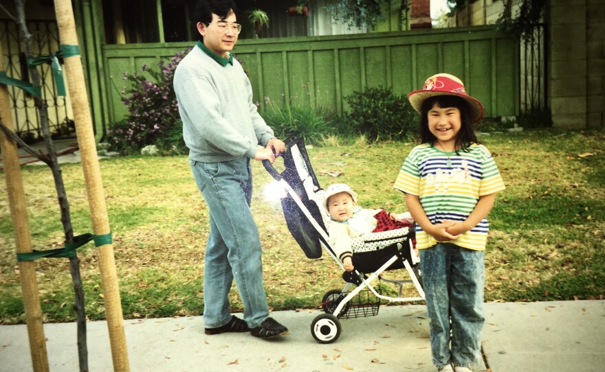 Anelise Chen with her father, Henry Chen, and baby sister, Angela Chen.