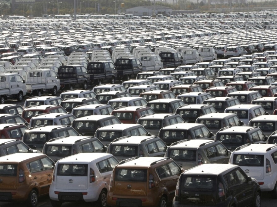 KIA Motor automobiles wait to be shipped to foreign countries at a port  in Gunsan, South Korea. Last year, South Korean automakers sold about 500,000 vehicles in the U.S., while U.S. auto companies sold 6,000 in South Korea. But a new free trade deal seeks to correct the imbalance.