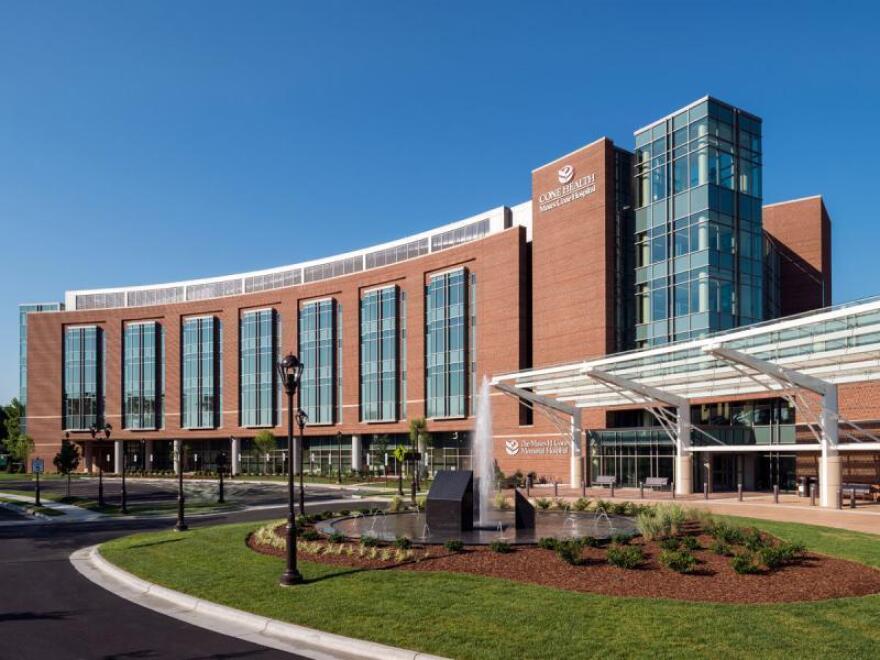 Cone Health officials say they will continue with the brand name following its acquisition by Risant. Image of Moses Cone Hospital in Greensboro courtesy of Cone Health.