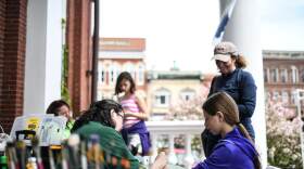 People painting at the Exeter Arts & Music fest.
