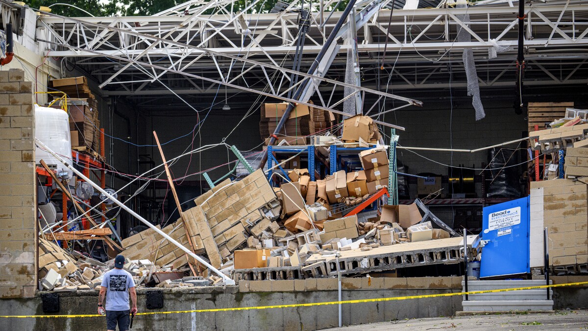 Building partially collapses as storm slams Milford, Orange area