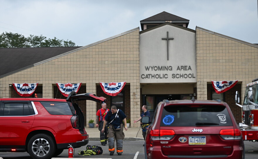 Firefighters are seen outside Wyoming Area Catholic School after battling a blaze there on Tuesday, Sept. 1, 2026.