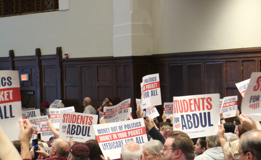 Supporters for Michigan's Democratic U.S. Senate candidate Abdul El-Sayed hold up signs at Plachta Auditorium on the campus of Central Michigan University on Friday, Oct. 9, 2026.