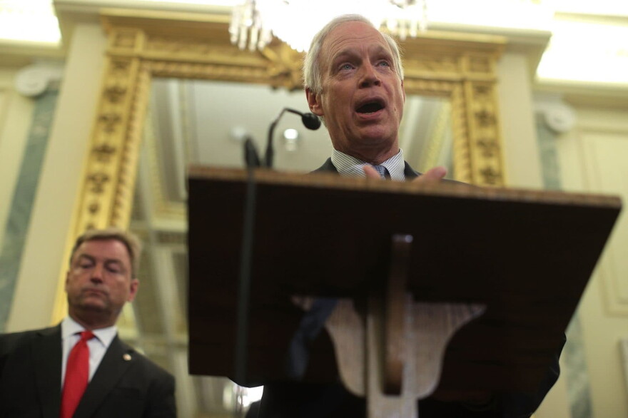 Sen. Ron Johnson (R-Wisc.) speaks as Sen. Dean Heller (R-Nev.) listens during a news conference on health care on Sept. 13, 2017, on Capitol Hill in Washington, D.C. (Alex Wong/Getty Images)