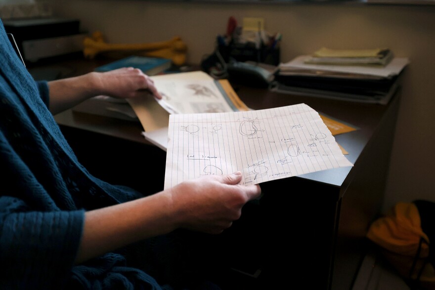 Stacy Turpin Cheavens (cq) shows a rough sketch she received from a doctor on Tuesday, March, 7, 2023, at the Missouri Orthopedic Institute in Columbia. “Somebody has to draw those and that’s exactly what I want to do,” she said after seeing anatomical art in medical settings.