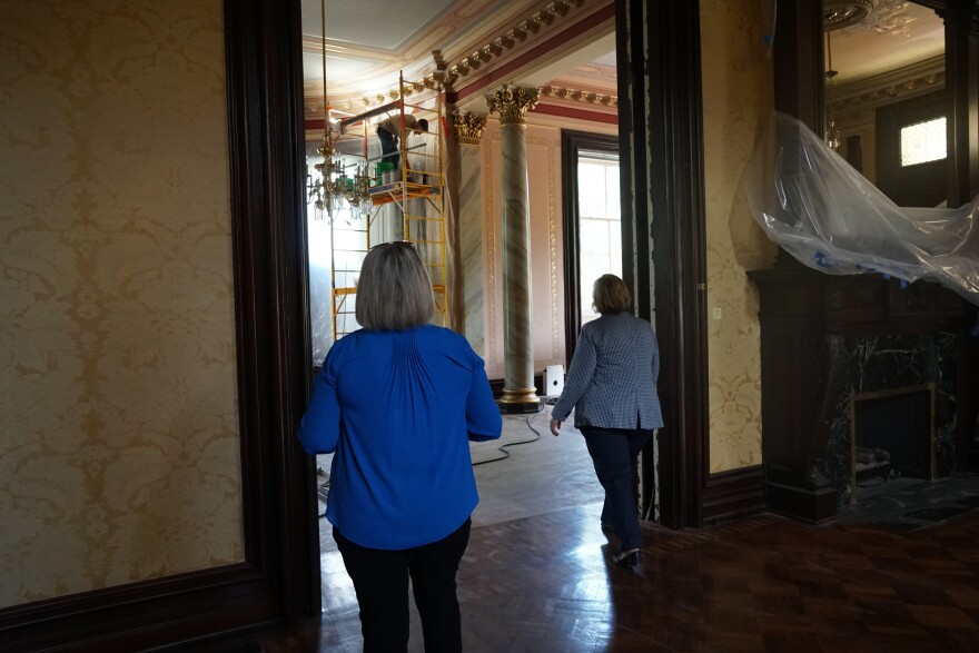 First Lady Teresa Parson (left) and project manager Sherry Kempf observe mansion renovations on Wednesday.