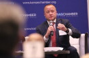 Democrat Chris Mann speaks to an audience at a Kansas Chamber of Commerce candidate forum.