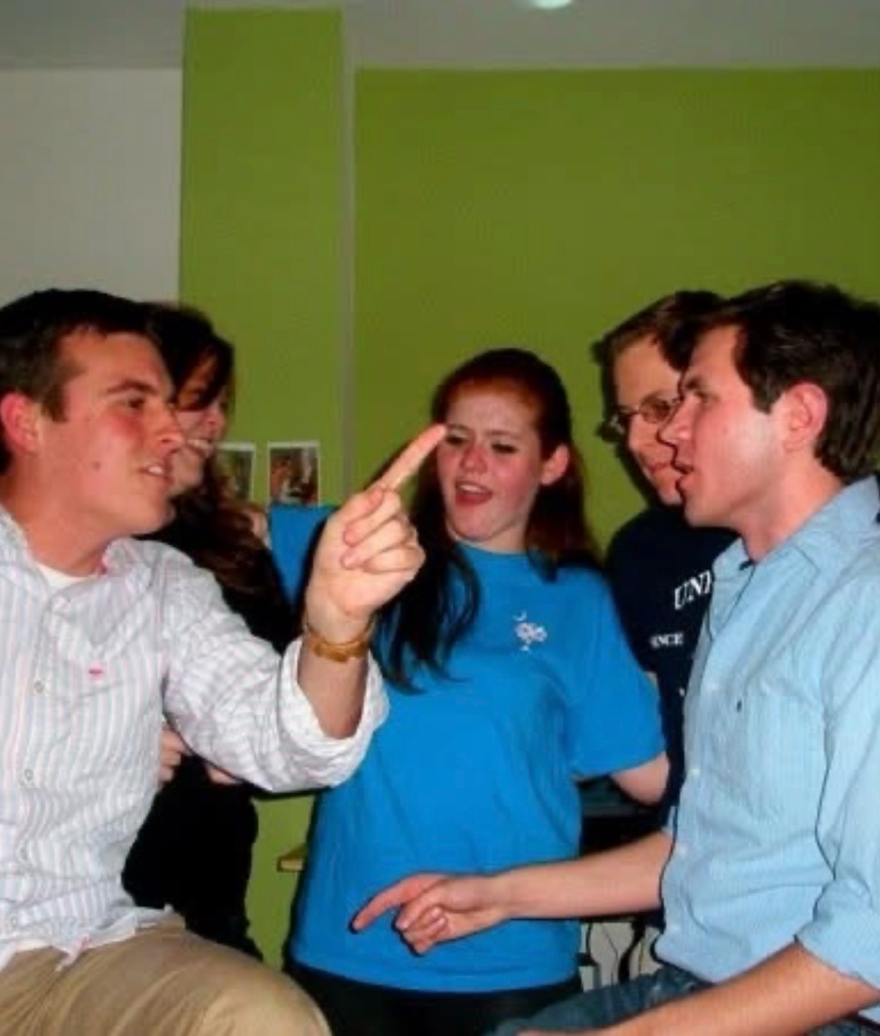 Hall (left), Talarico (right) and friends at one of their get-togethers where they would watch The West Wing.