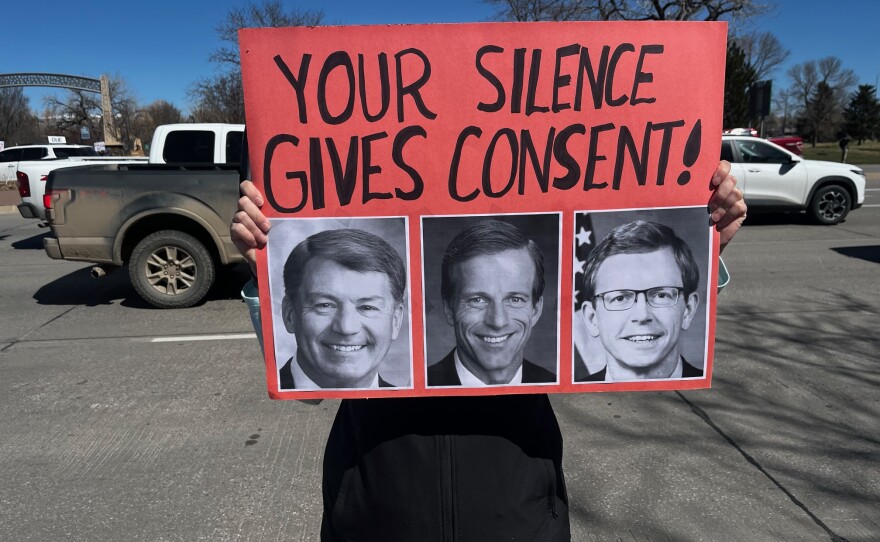 A sign depicting the South Dakota Congressional delegation