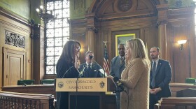 Incoming Springfield Chief Administrative and Financial Officer Cathy Buono (left) is sworn in by City Clerk and Election Commissioner Gladys Oyola (right)