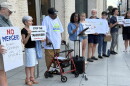 Community advocate Kim Sudderth speaks to the crowd gathered outside Norfolk's Slover library before an event with Lt. Gov. Ghazala Hashmi and local representatives Sept. 8, 2026.