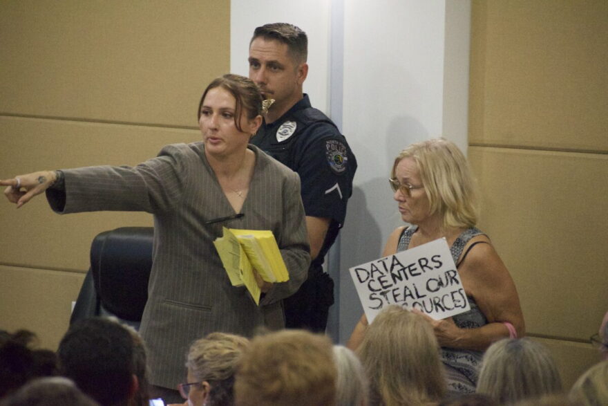 A North Port staffer directs a public commenter.
