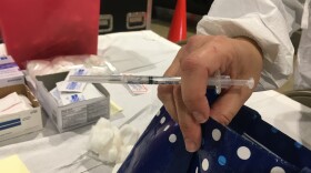 A drive-thru vaccination station has been in operation at the Pipkin building for weeks. 