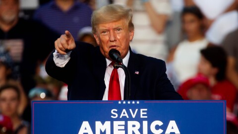 Former President Donald Trump points out the media on Saturday, June 25, 2022, at a “Save America!” Rally at the Adams County Fairgrounds in Mendon, Ill.