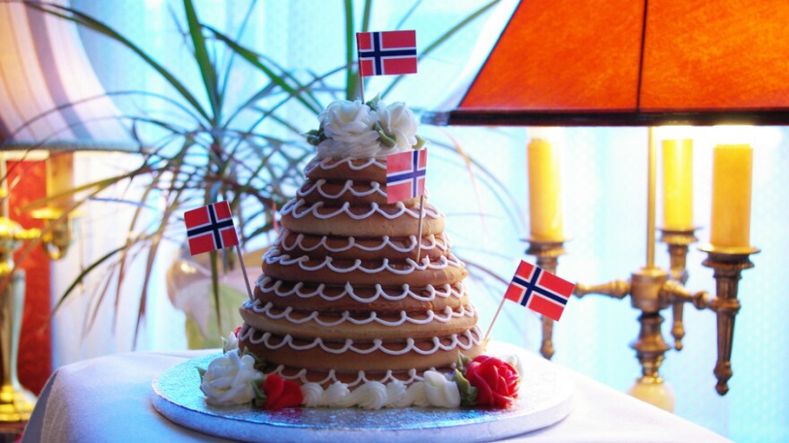 In Denmark they eat a towering cake called <em>kransekage</em> for New Year's Eve. Norwegians, who also eat it, call it <em>kransekake.</em>