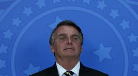 PANDEMIC CRIMINAL? Brazilian President Jair Bolsonaro in Brasilia on Wednesday as a Senate panel recommended crimes against humanity charges against him.