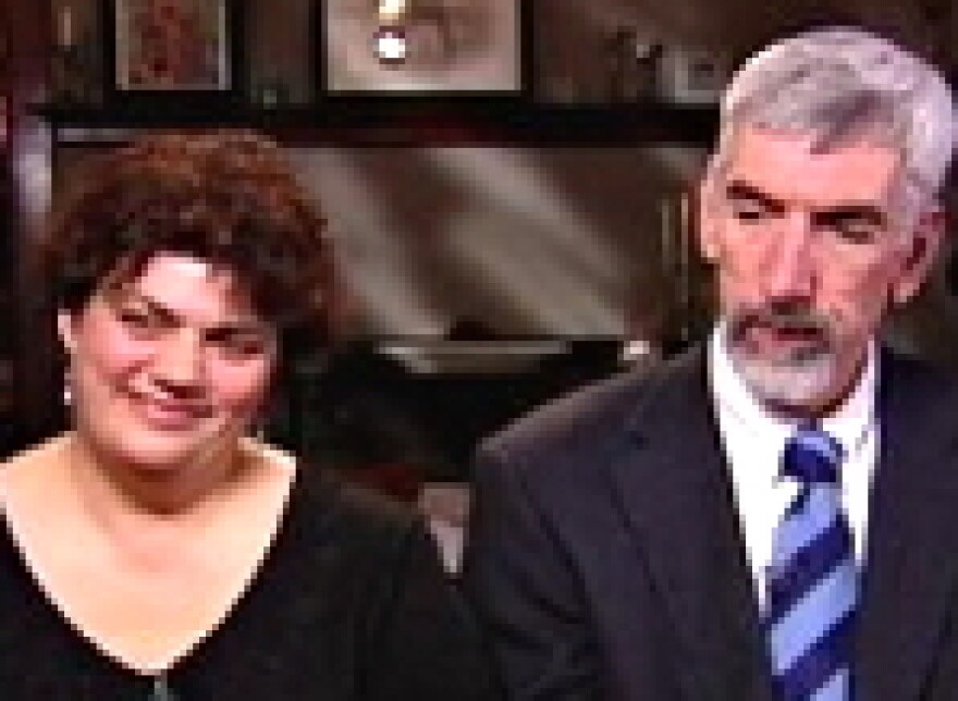 Mayor Mark Funkhouser and his controversial wife, Gloria Squitiro, tell TV viewers of their battles over her volunteer service in his office.