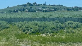 the highland flats land is seen from I-80 beneath Highland Estates in 2023