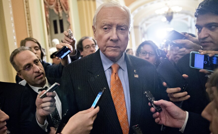 Utah Republican Orrin Hatch, the chairman of the Senate Finance Committee, speaks to members of the media after a weekly GOP luncheon meeting on Tuesday.