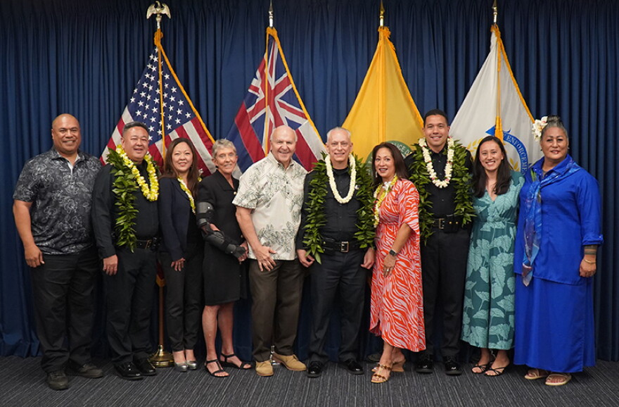 Honolulu Mayor Rick Blangiardi and Police Chief David Lazar (center) held a news conference announcing leadership changes to the Honolulu Police Department. Brandon Nakasato