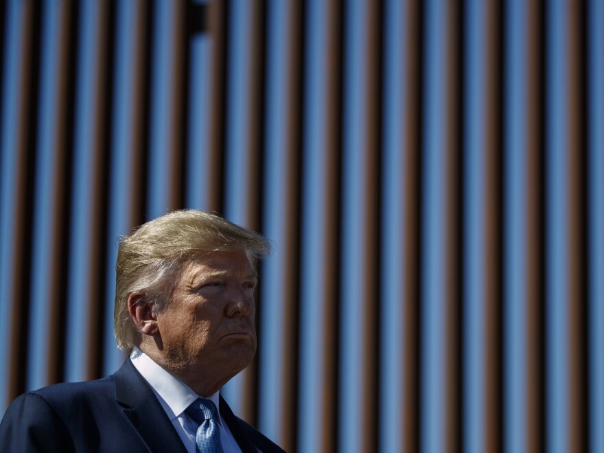 President Trump tours a section of the southern border wall in 2019, in Otay Mesa, Calif.