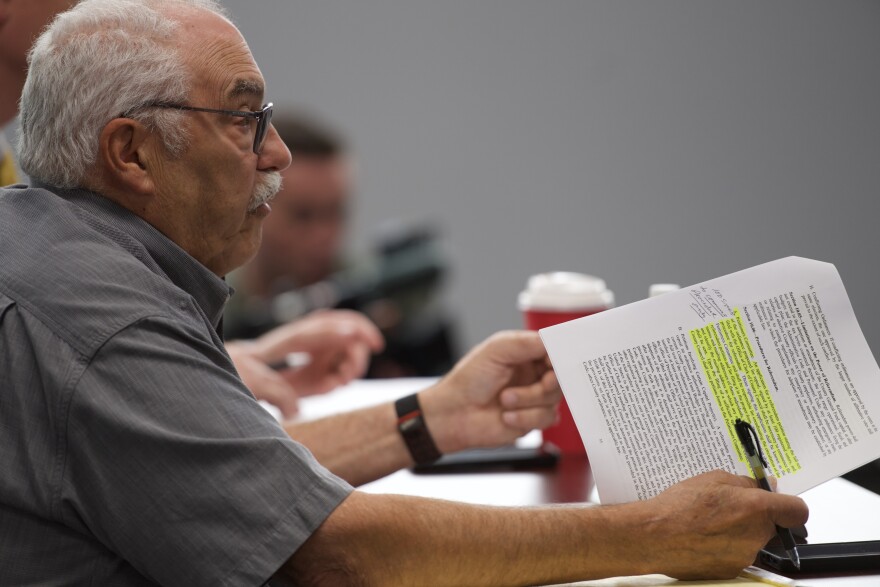 Walter Griffith talks at a hearing for a petition for referendum on the county's non-discrimination ordinance.