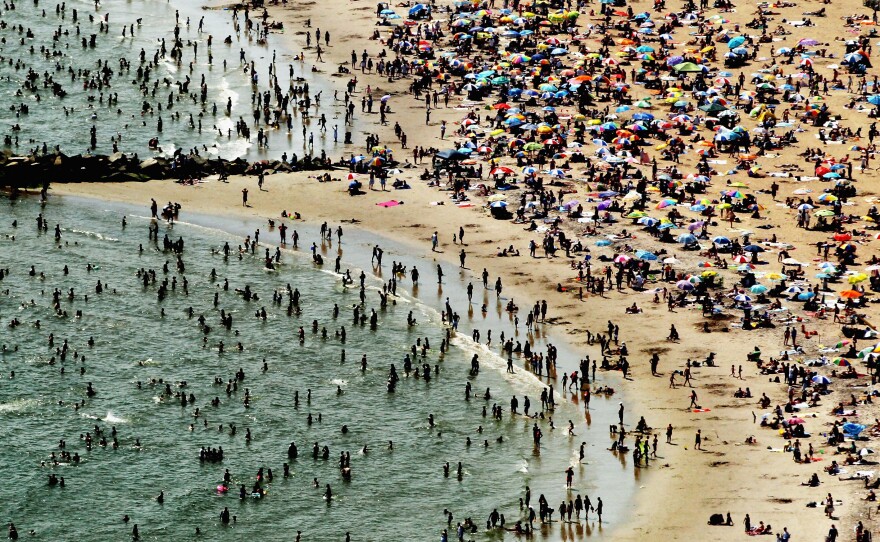 According to the National Oceanic and Atmospheric Administration, the past year through June 2012 has been the hottest year in the continental U.S. since modern record keeping started in 1895. Above, New Yorkers flocked to Coney Island to try to beat the heat in early August.