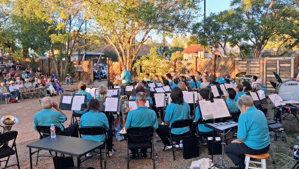Karen Steele introduces the Four Corners Community Band during the world premiere of Jadon Cruzan's Cortez Overture on Aug. 15 at the Cortez Cultural Center. The piece was written in celebration of Cortez’s 140th anniversary. Photo by LP McKay/KSJD