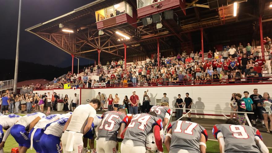 All Star football players from Ashland and Phoenix high schools join all stars from Japan in greeting the crowd at Ashland High School after the 2025 Pacific Rim Bowl football game on July 25, 2025.