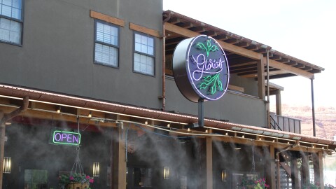 Restaurants like this one in Moab, Utah in July 2025, frequently use patio misters to keep outdoor diners cool during the summer months.