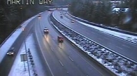 Snow falls on Olympia commuters during the 7 a.m. commute today. More is on the way for most of Western Washington.
