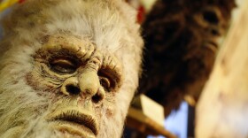 Bigfoot masks on display at a museum