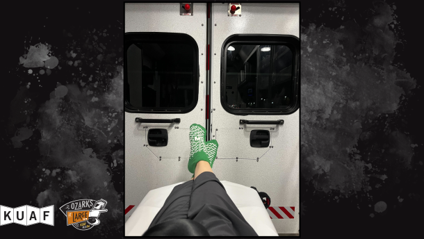A woman's feet in an ambulance.