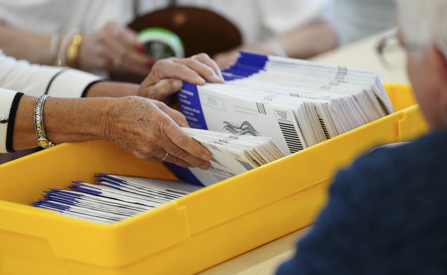 Workers sort mail-in ballots April 23, 2024, at Northampton County Courthouse in Easton, Northampton County, Pennsylvania. 