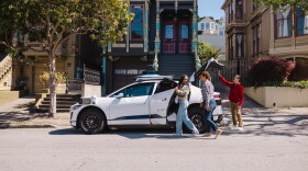 people get into a white car