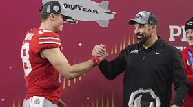 Ohio State quarterback Will Howard, left, celebrates with head coach Ryan Day after the Cotton Bowl College Football Playoff semifinal game against Texas, Friday, Jan. 10, 2025, in Arlington, Texas.