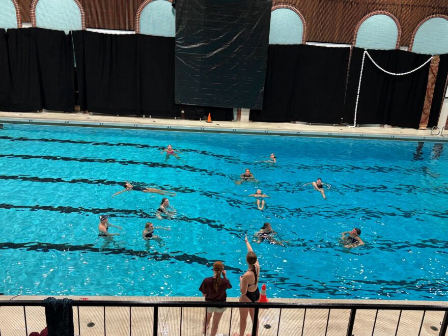 Two senior Sharks instruct their peers as they adjust the formation for the routine. They were in charge of creating this routine and teaching the choreography to the girls for this week’s pageant.