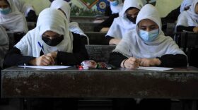 Schoolgirls attend class in Herat on August 17, 2021, following the Taliban stunning takeover of the country. (Photo by AREF KARIMI / AFP) (Photo by AREF KARIMI/AFP via Getty Images)