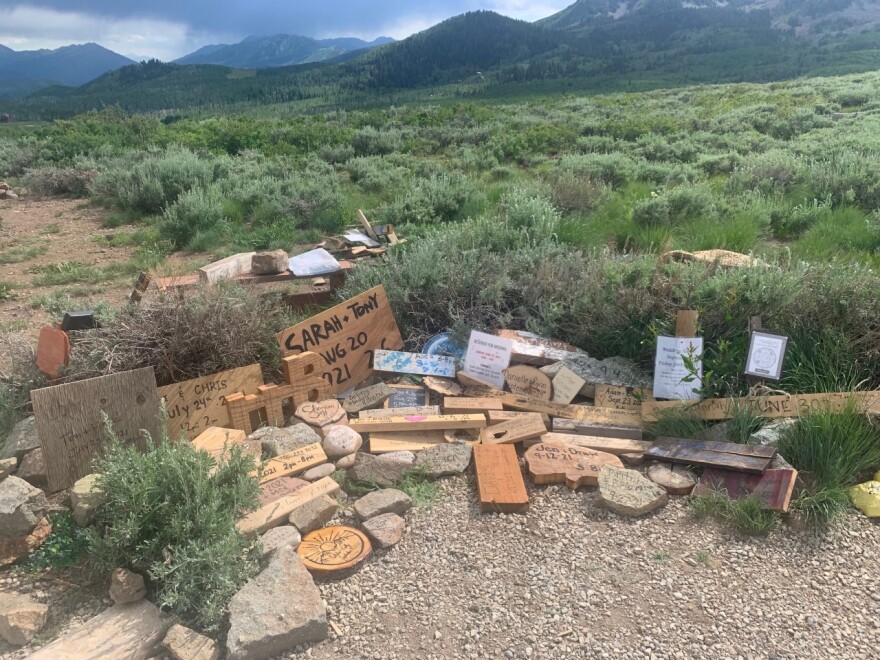 Couples leave rocks and planks of wood with dates and times to claim a day for their wedding