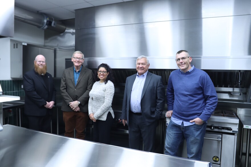 St. Luke's Episcopal Church will start hosting classes for formerly incarcerated people at its Cypress House Bakery in January 2026. Cypress House board members and its CEO stand inside of the newly renovated kitchen. From left to right: Reverend Tyler Parry, Priest-in-Charge at St. Luke’s and Cypress House's President and CEO; Ken Goody, Cypress House board member and Foundation Executive of the D H Ross Foundation; Alejandra Marroquin, Cypress House board member and social worker with the Geisinger Commonwealth School of Medicine; Thomas Vanaskie, Cypress House board member and former U.S. Court of Appeals judge; and Brian Goble, Operations Manager at Cypress House at St. Luke's.