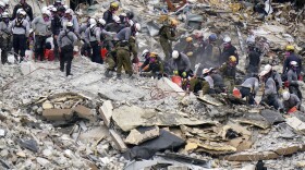 Crews from the U.S. and Israel work in the rubble Champlain Towers South condo on June 29, 2021, in Surfside, Fla. Many people were still unaccounted for after Thursday's fatal collapse. (Lynne Sladky/AP)