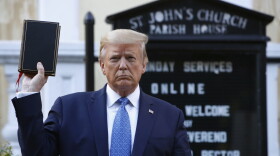 President Donald Trump holds a Bible as he visits outside St. John's Church across Lafayette Park from the White House Monday, June 1, 2020, in Washington. (Patrick Semansky/AP Photo)