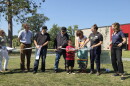 Representatives of the Red Lake Tribal Council, Endazhi-Nitaawiging Charter School and Trust for Public Land cut the ribbon for a new natural playground during a ceremony on Aug. 25, 2026.