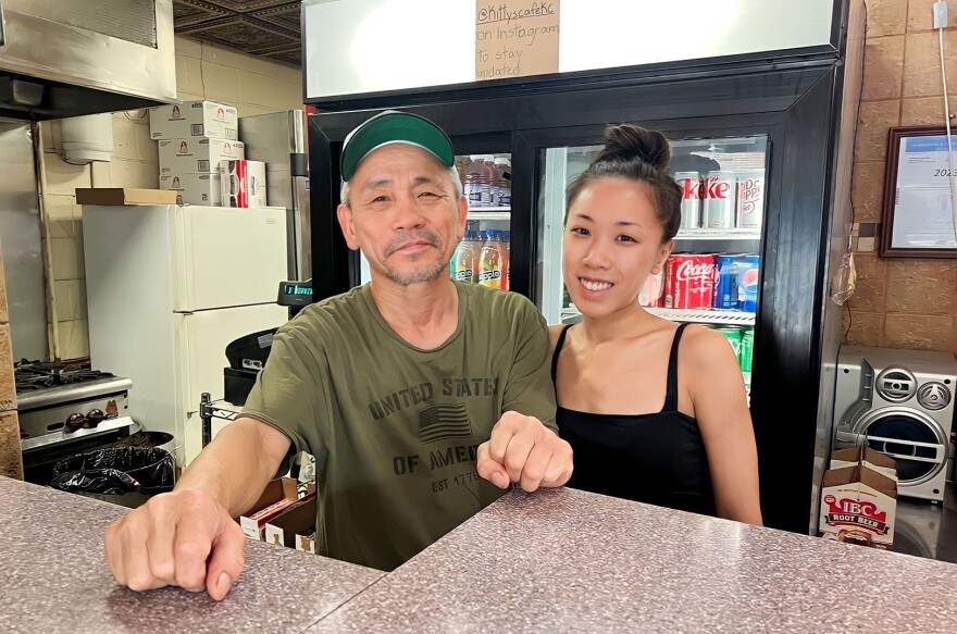 Charley and Jenna Soulivong behind the counter of Kitty's Cafe on 31st Street.