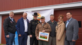 The Orange County Land Trust announced Thursday that it has closed a $2.35 million deal to purchase Sugar Loaf Mountain in the town of Chester. 