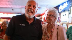 Mayor-elect Jim Ross, left, listens to speeches in his honor with his mother Jo Ross during his Election Night watch party May 2 at J. Gilligan’s Bar and Grill in Arlington.