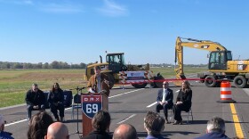 Kentucky Gov. Andy Beshear addresses a gathering celebrating the completion of Section 1 of the I-69 ORX project in Henderson