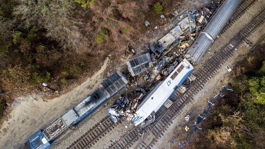 An aerial view of the site in Cayce, S.C., where an Amtrak passenger train (bottom right) slammed into a CSX freight train early Sunday morning. At least two Amtrak crew members were killed and more than 100 people injured, authorities said.