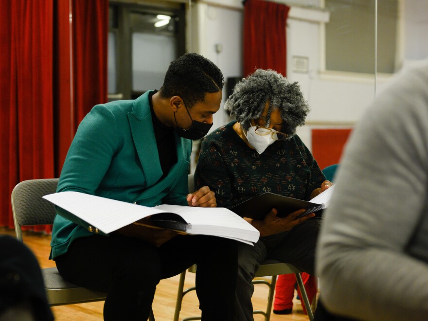 Chorus director Malcolm J. Merriweather, left, and composer Mary D. Watkins, right, review the chorus music for<em> Emmett Till, A New American Opera</em> at Ripley-Grier Rehearsals in New York, NY on March 17, 2022.